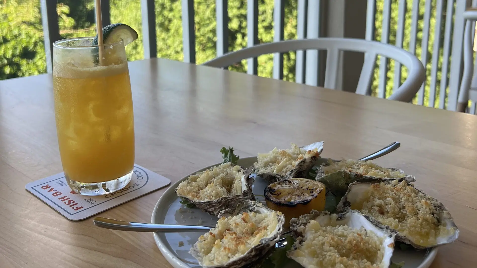 Baked oysters and an Ay Papí cocktail at Fish Bar in St. Thomas, VI.