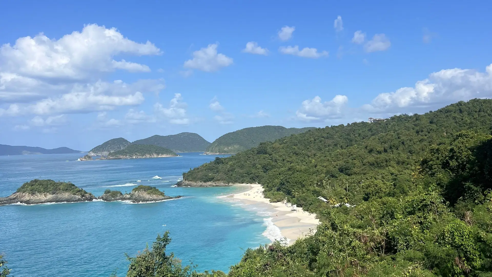 Beautiful view of Cinnamon Bay beach, St John, with crystal-clear waters and white sand in the US Virgin Islands