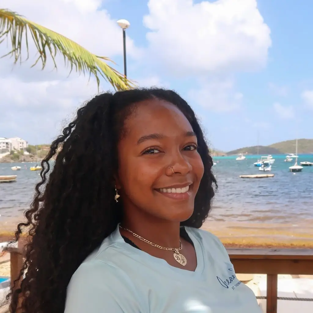 Love of Salt founder near the harbor in St. Thomas, USVI, offering Caribbean web design consultations